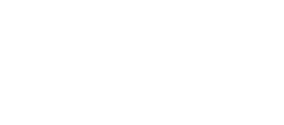 A sign that says "Catalina Crossing Apartments".